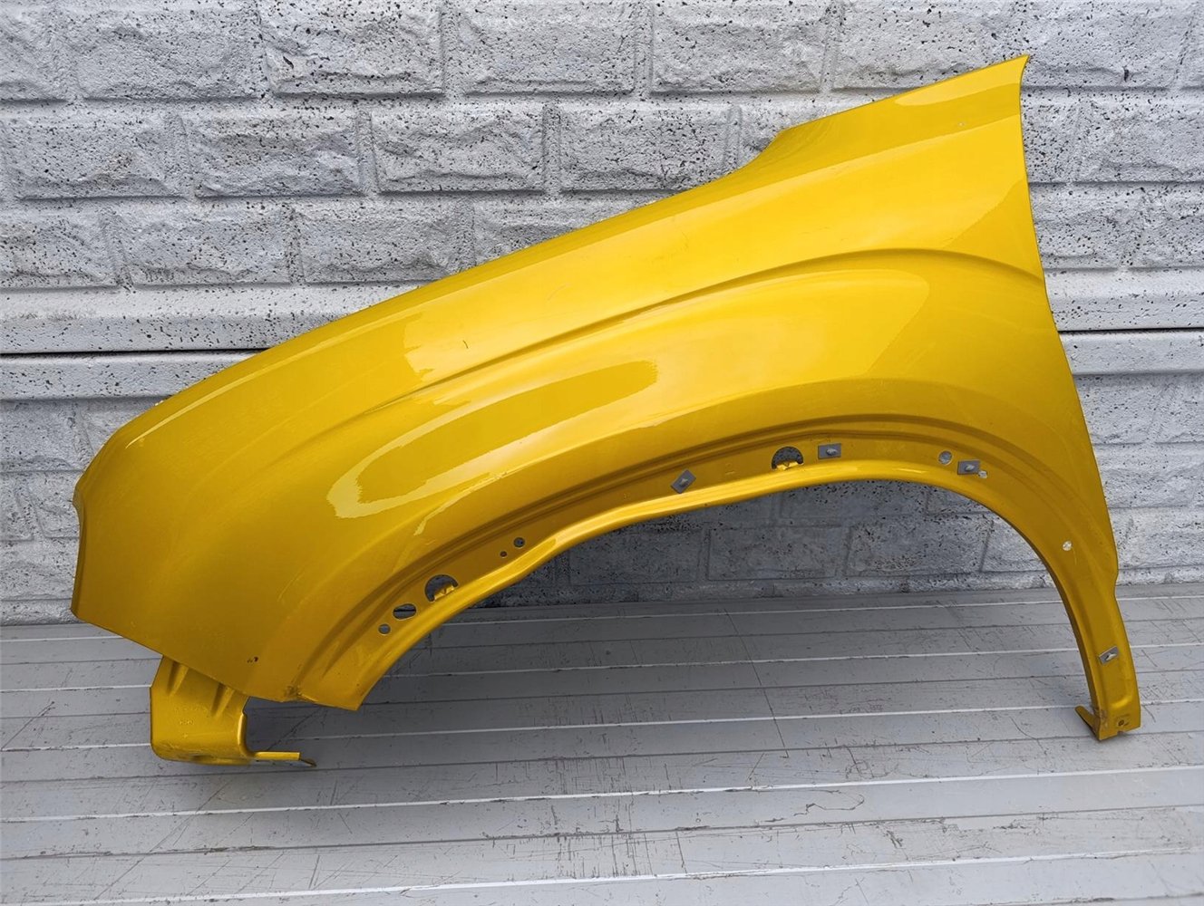 JEEP AVENGER BŁOTNIK LEWY ORYGINAŁ (17434522609)