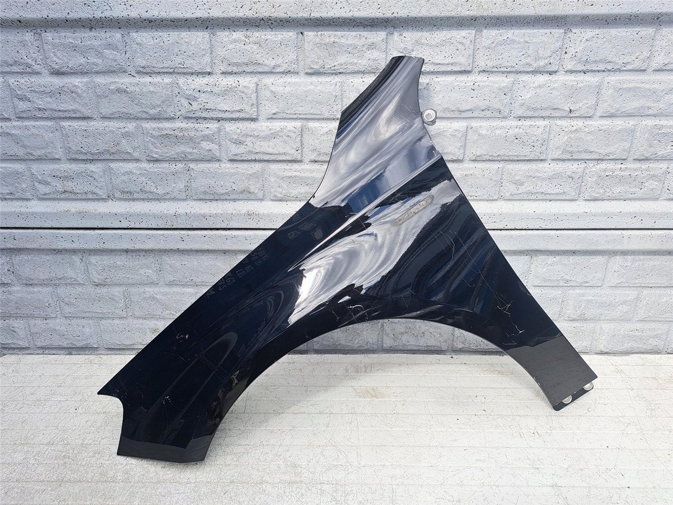 MERCEDES A-KLASA W176 12-19 BŁOTNIK LEWY PRZEDNI ORYGINAŁ (17440194552)