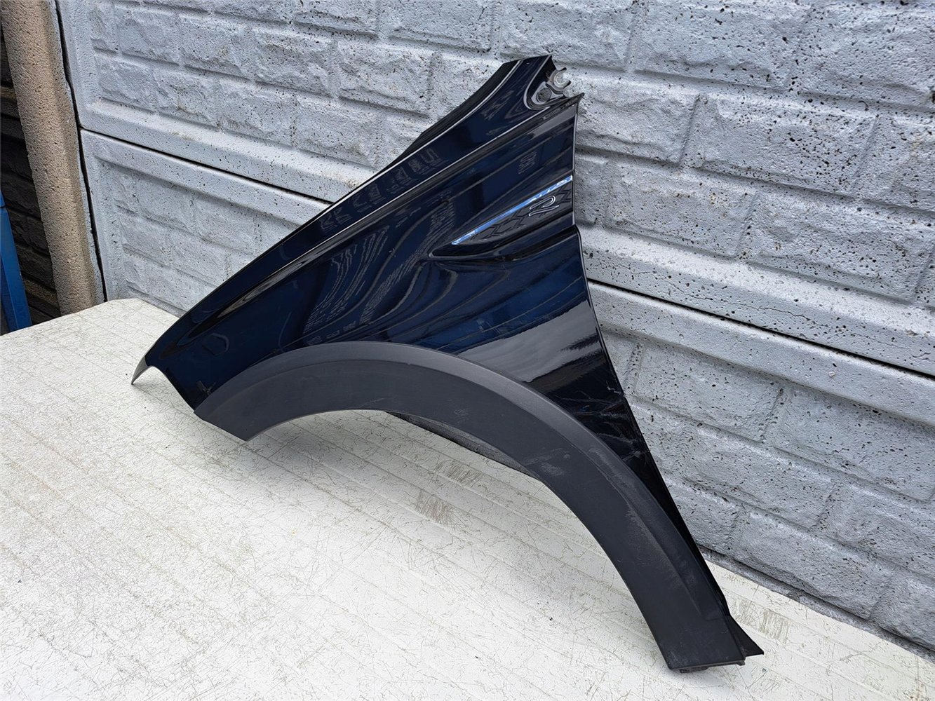 VW TAIGO BŁOTNIK LEWY PRZEDNI ORYGINAŁ (17441518492)