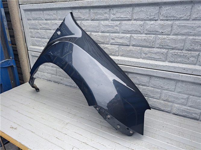 DACIA DUSTER I 1 BŁOTNIK PRAWY PRZEDNI ORYGINAŁ (17441566823)