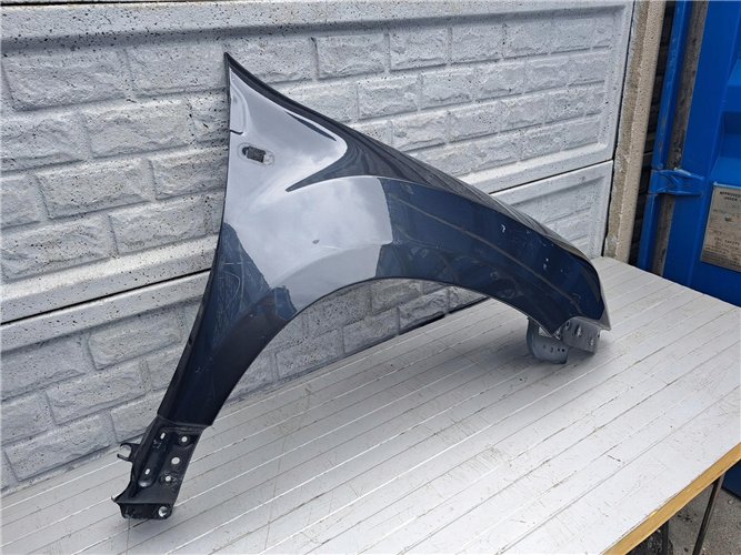 DACIA DUSTER I 1 BŁOTNIK PRAWY PRZEDNI ORYGINAŁ (17441566823)