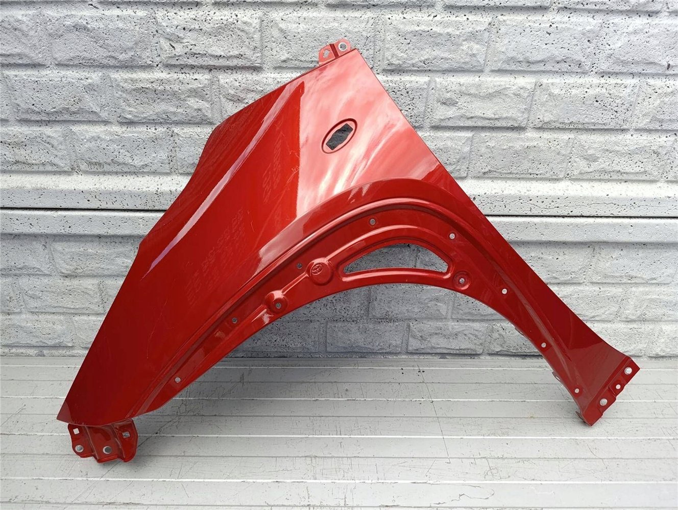 BŁOTNIK LEWY PRZÓD TOYOTA AYGO X 22-24 ORYGINAŁ (17447050790)