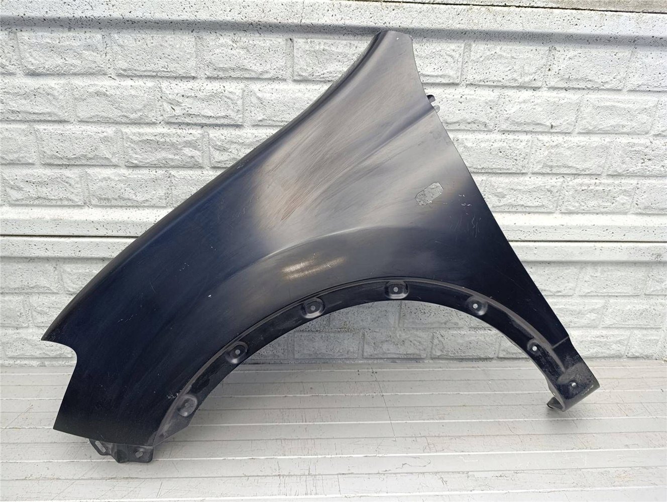 BŁOTNIK PRZEDNI LEWY NISSAN QASHQAI 10-14 LIFT ORYGINAŁ (17447096334)