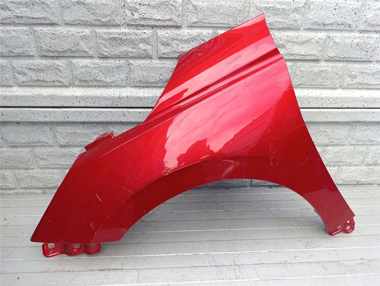 SUZUKI SWIFT Mk9 BŁOTNIK PRZEDNI LEWY ORYGINAŁ (17460988717)