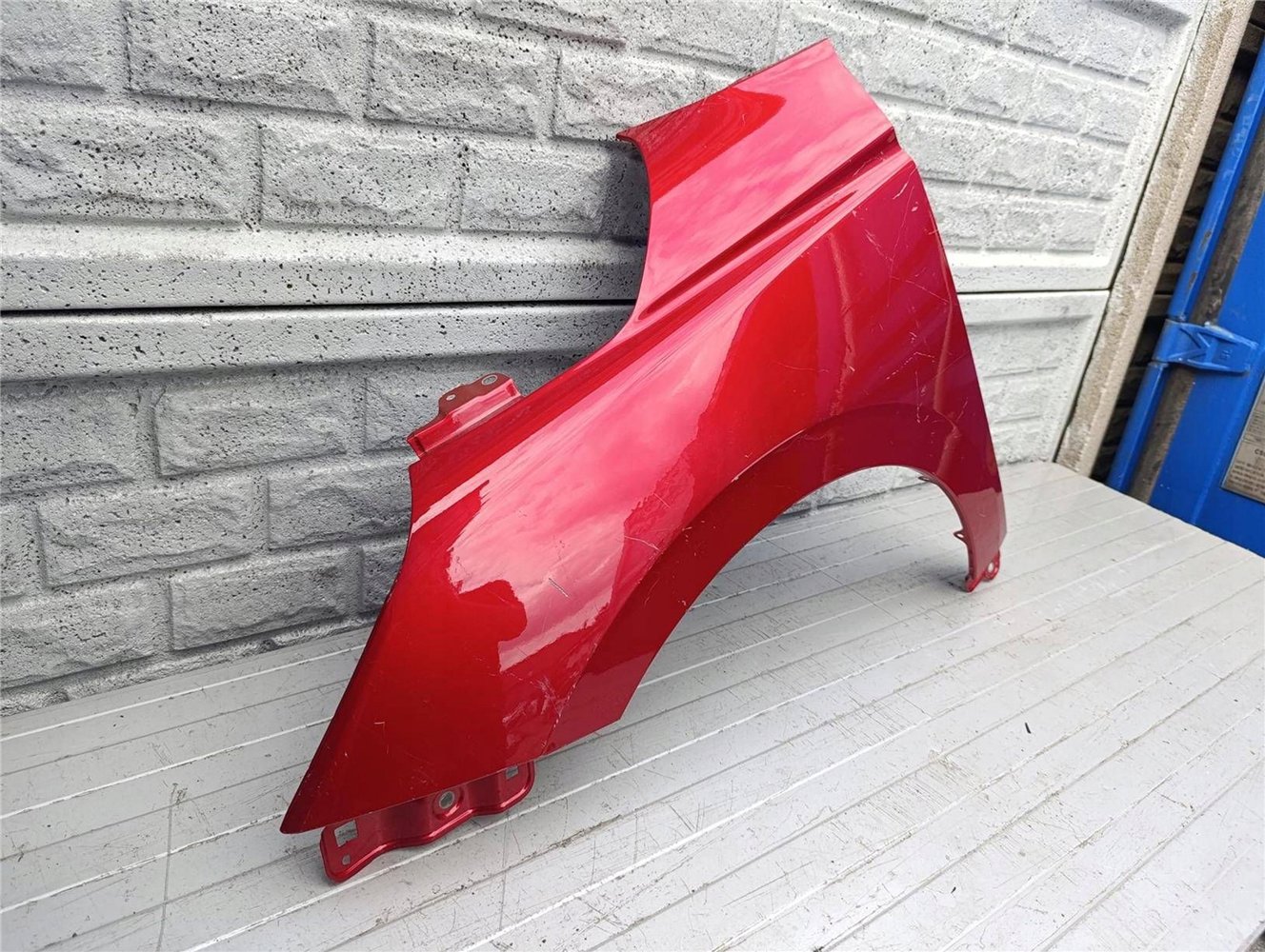 SUZUKI SWIFT Mk9 BŁOTNIK PRZEDNI LEWY ORYGINAŁ (17460988717)