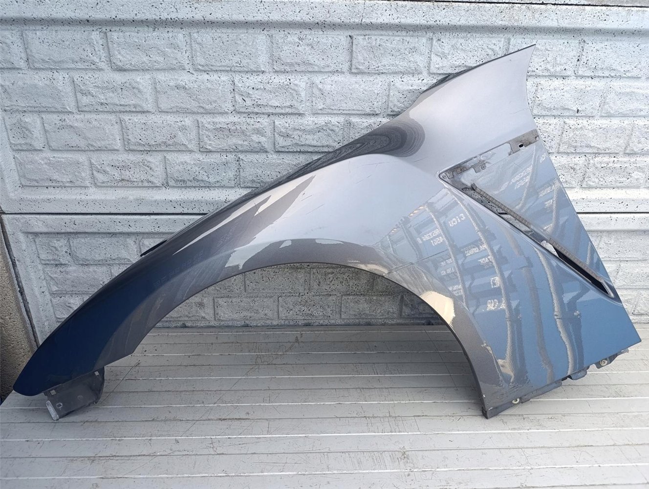 NISSAN GT-R GTR BŁOTNIK PRZEDNI LEWY ORYGINALNY ORYGINAŁ (17484603981)