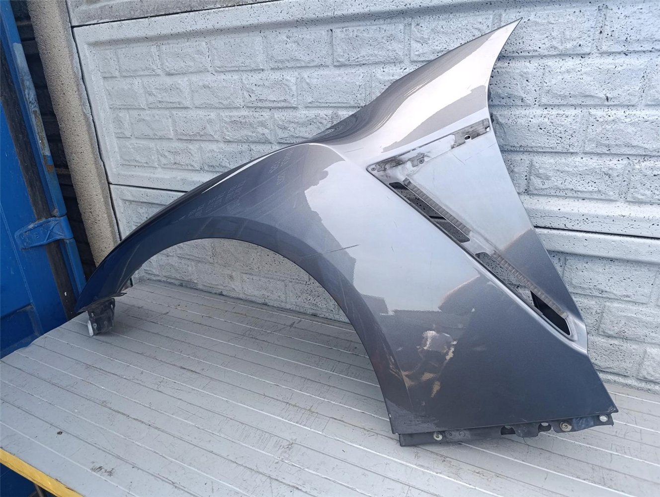 NISSAN GT-R GTR BŁOTNIK PRZEDNI LEWY ORYGINALNY ORYGINAŁ (17484603981)