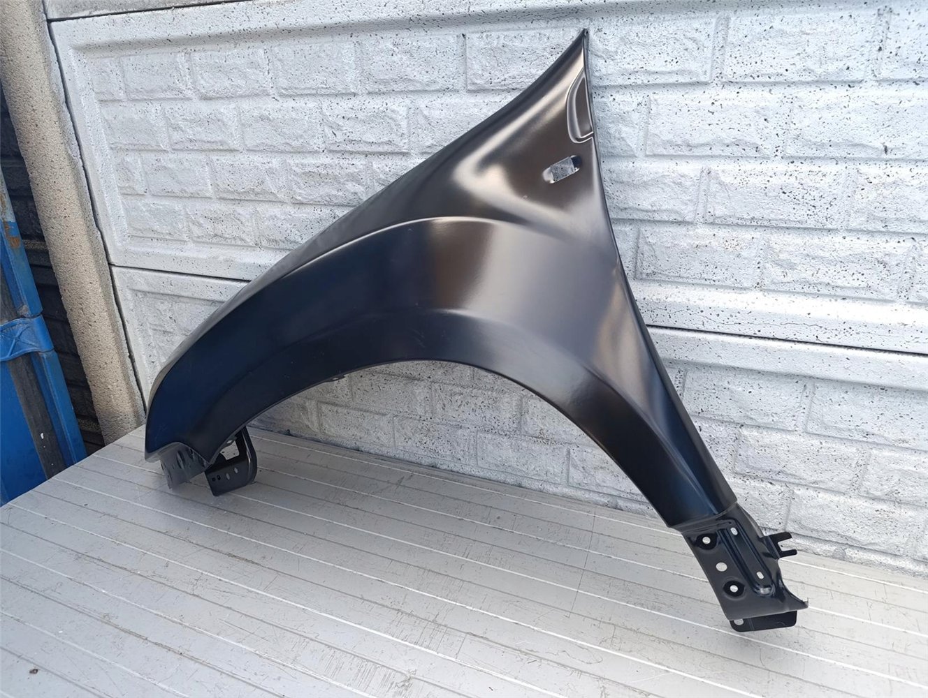 DACIA DUSTER I 1 BŁOTNIK LEWY PRZEDNI NOWY ORYGINAŁ (17484606105)