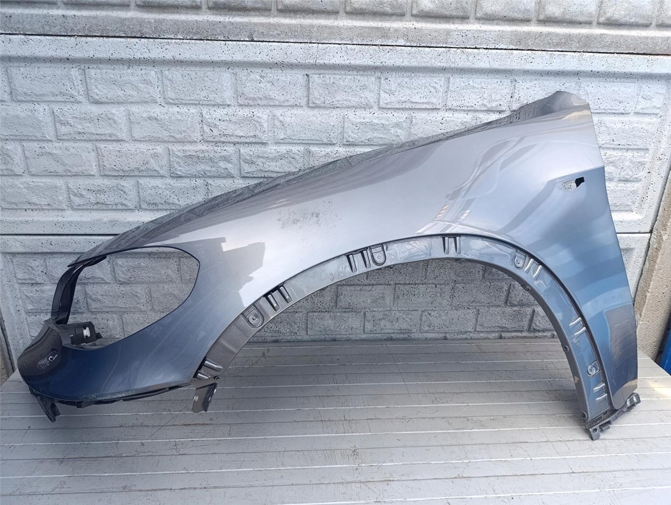 BMW X5 E70 LIFT 2010- BŁOTNIK PRZEDNI LEWY ORYGINAŁ (17484608420)