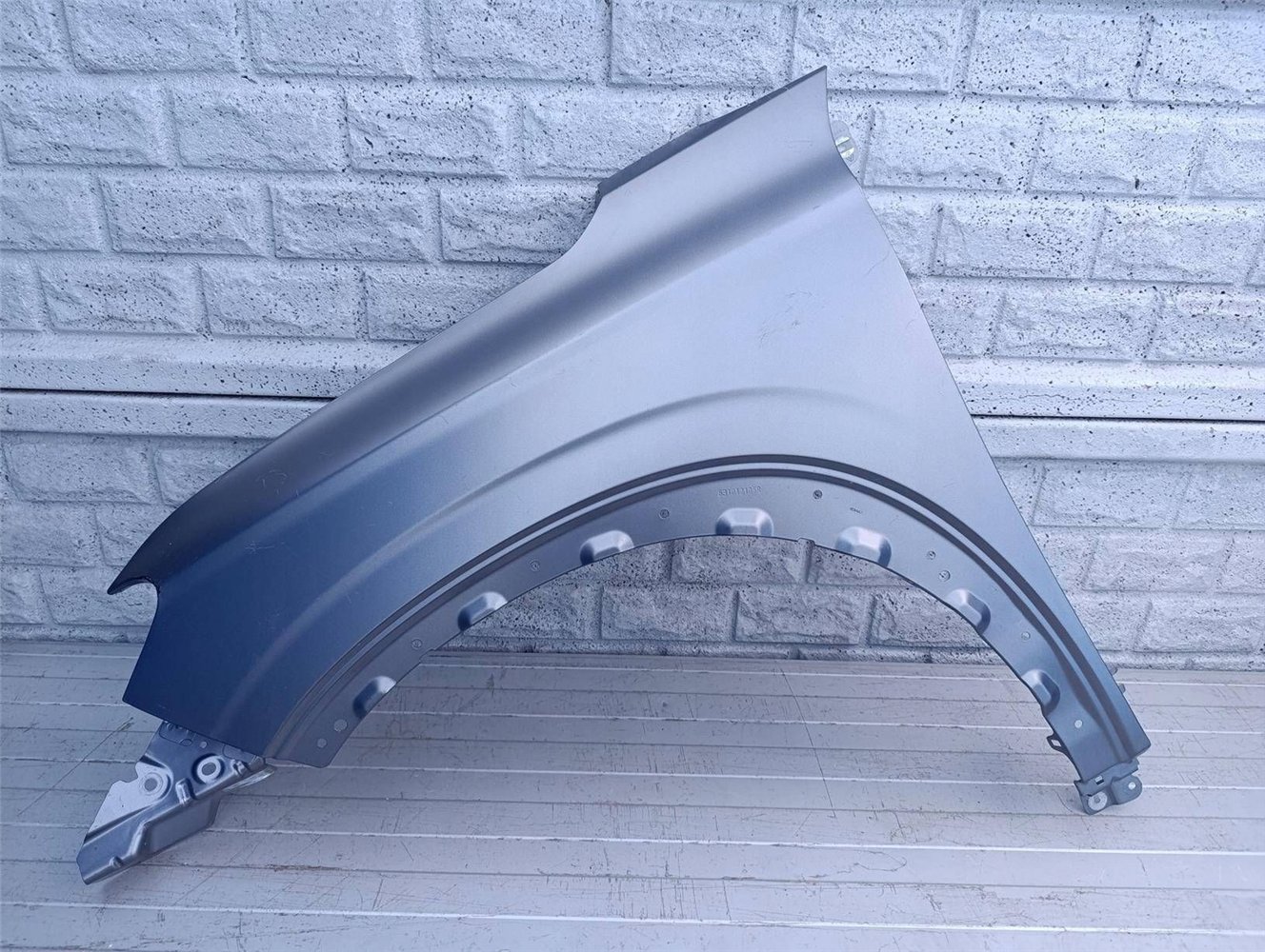 RENAULT AUSTRAL 22- BŁOTNIK LEWY PRZEDNI ORYGINAŁ (17490075678)