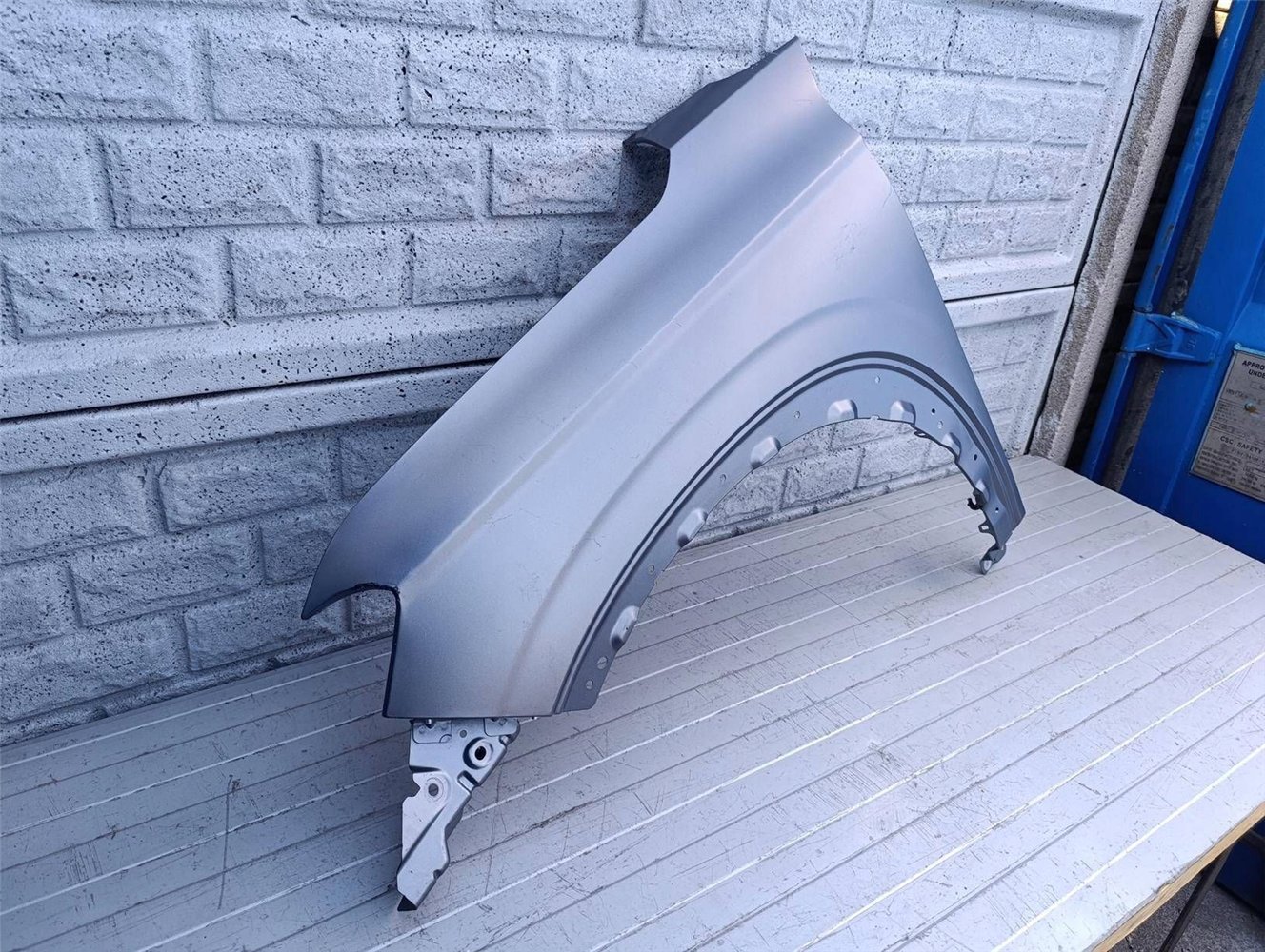 RENAULT AUSTRAL 22- BŁOTNIK LEWY PRZEDNI ORYGINAŁ (17490075678)