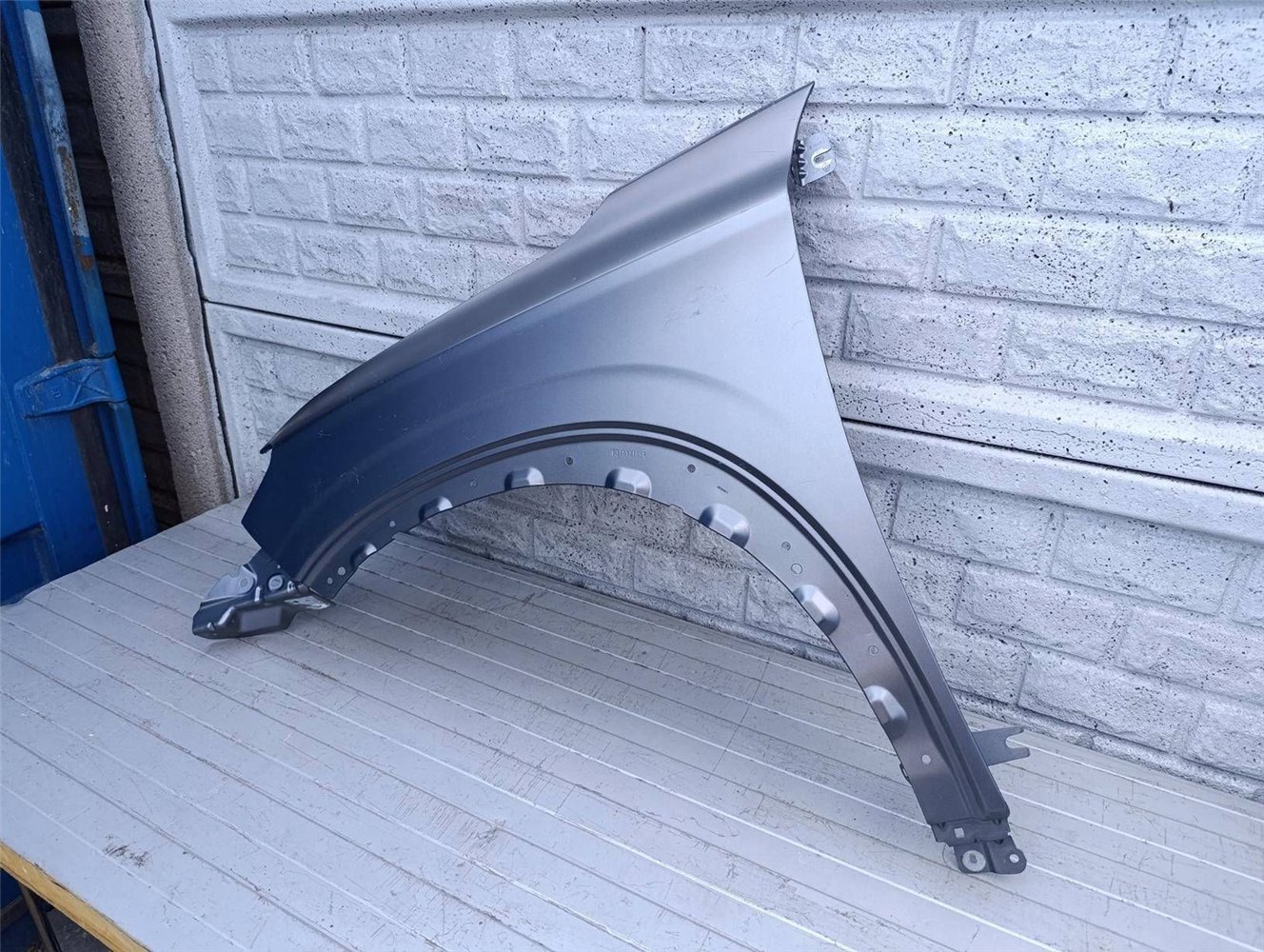 RENAULT AUSTRAL 22- BŁOTNIK LEWY PRZEDNI ORYGINAŁ (17490075678)