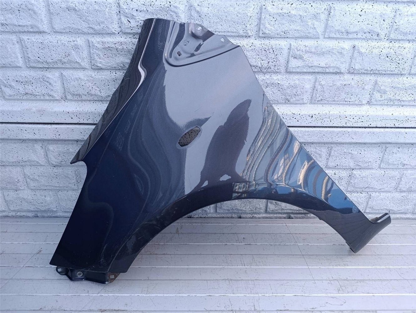 TOYOTA YARIS 2 II 05-12 BŁOTNIK LEWY PRZÓD ORYGINAŁ (17490079492)