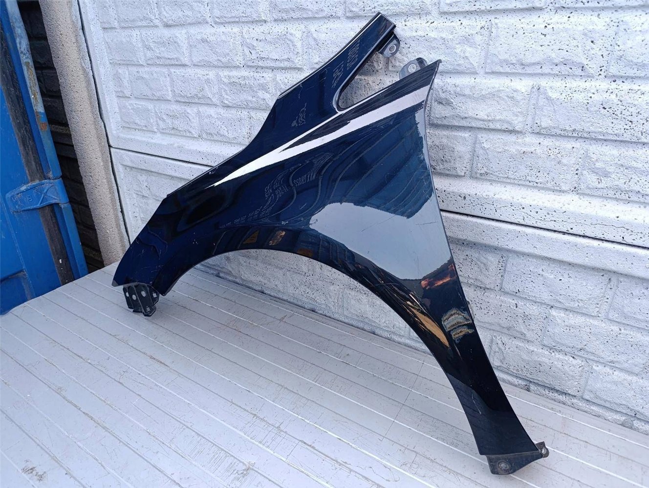 TOYOTA AVENSIS III T28 T29 15- BŁOTNIK LEWY ORYGINAŁ (17490230006)