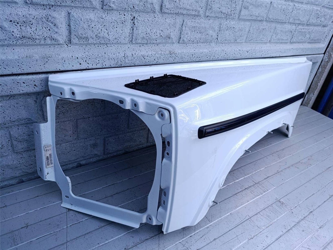 MERCEDES G-KLASA W463 BŁOTNIK PRZEDNI LEWY ORYGINAŁ (17490255887)