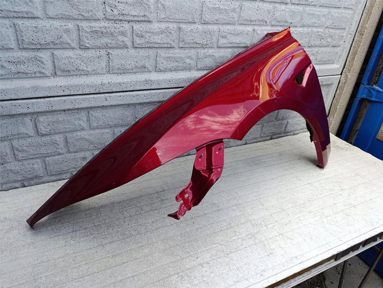 TESLA 3 III 2024- BŁOTNIK PRZEDNI LEWY ORYGINAŁ (17506983141)