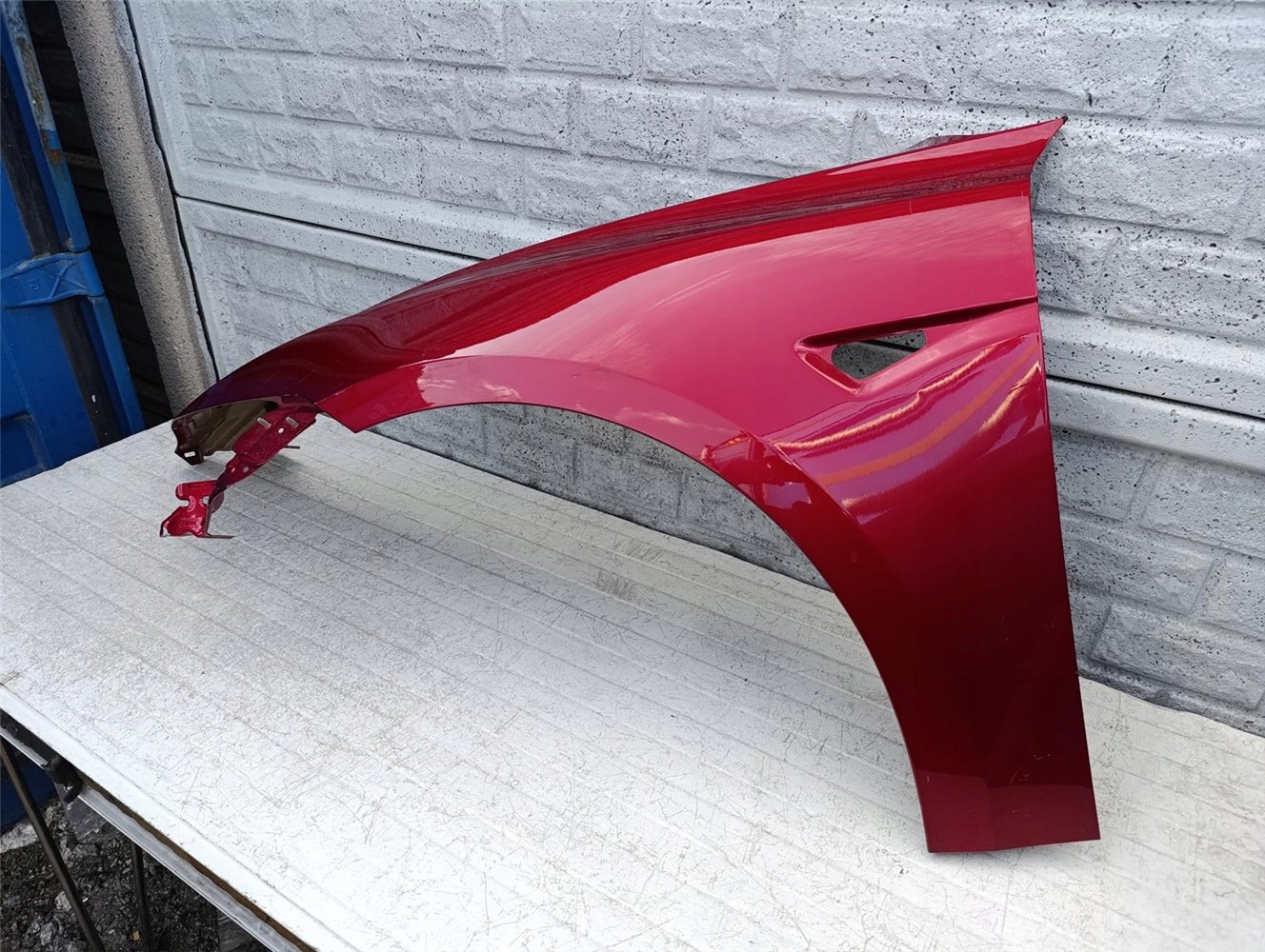 TESLA 3 III 2024- BŁOTNIK PRZEDNI LEWY ORYGINAŁ (17506983141)