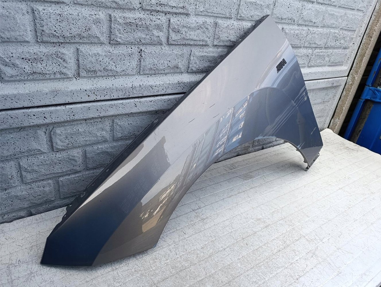 BMW iX i-X BŁOTNIK LEWY PRZEDNI ORYGINAŁ (17506986214)