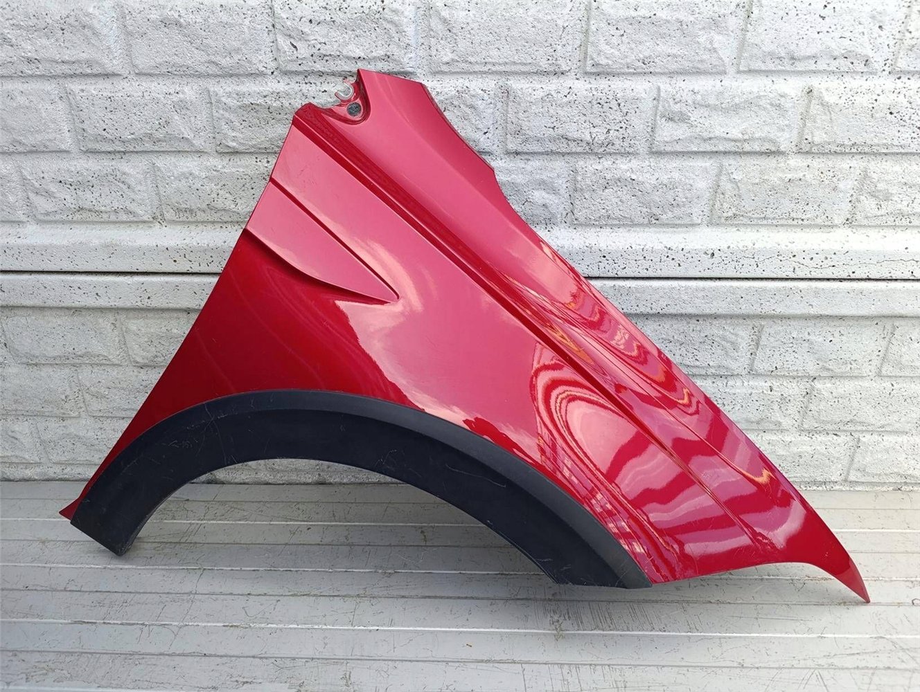 VW TAIGO BŁOTNIK PRAWY PRZEDNI ORYGINAŁ (17507008019)