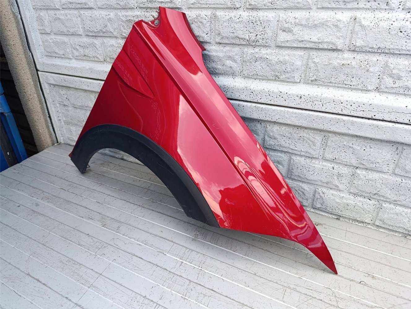 VW TAIGO BŁOTNIK PRAWY PRZEDNI ORYGINAŁ (17507008019)