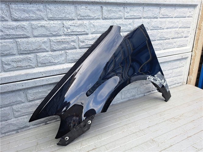 VW TOURAN LIFT BŁOTNIK LEWY 2007-2010 ORYGINAŁ (17507429484)