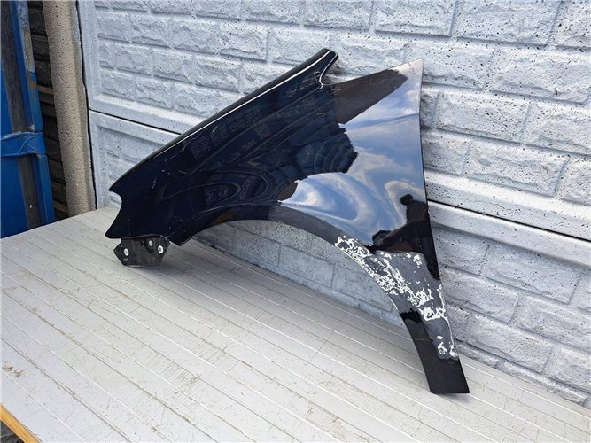 VW TOURAN LIFT BŁOTNIK LEWY 2007-2010 ORYGINAŁ (17507429484)