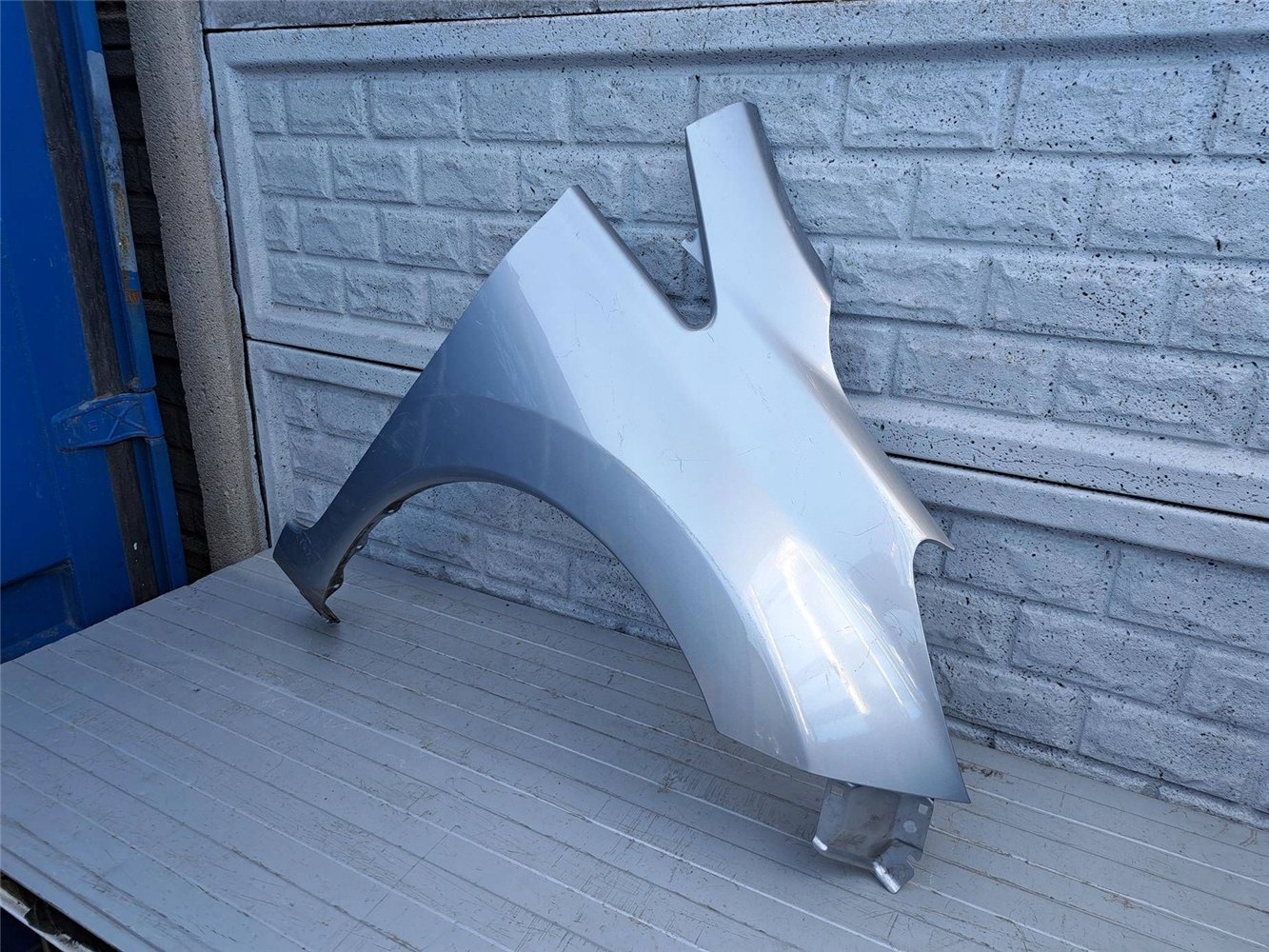 NISSAN NOTE 2 II 2013-2020 BŁOTNIK PRZEDNI PRAWY ORYGINAŁ (17507533522)