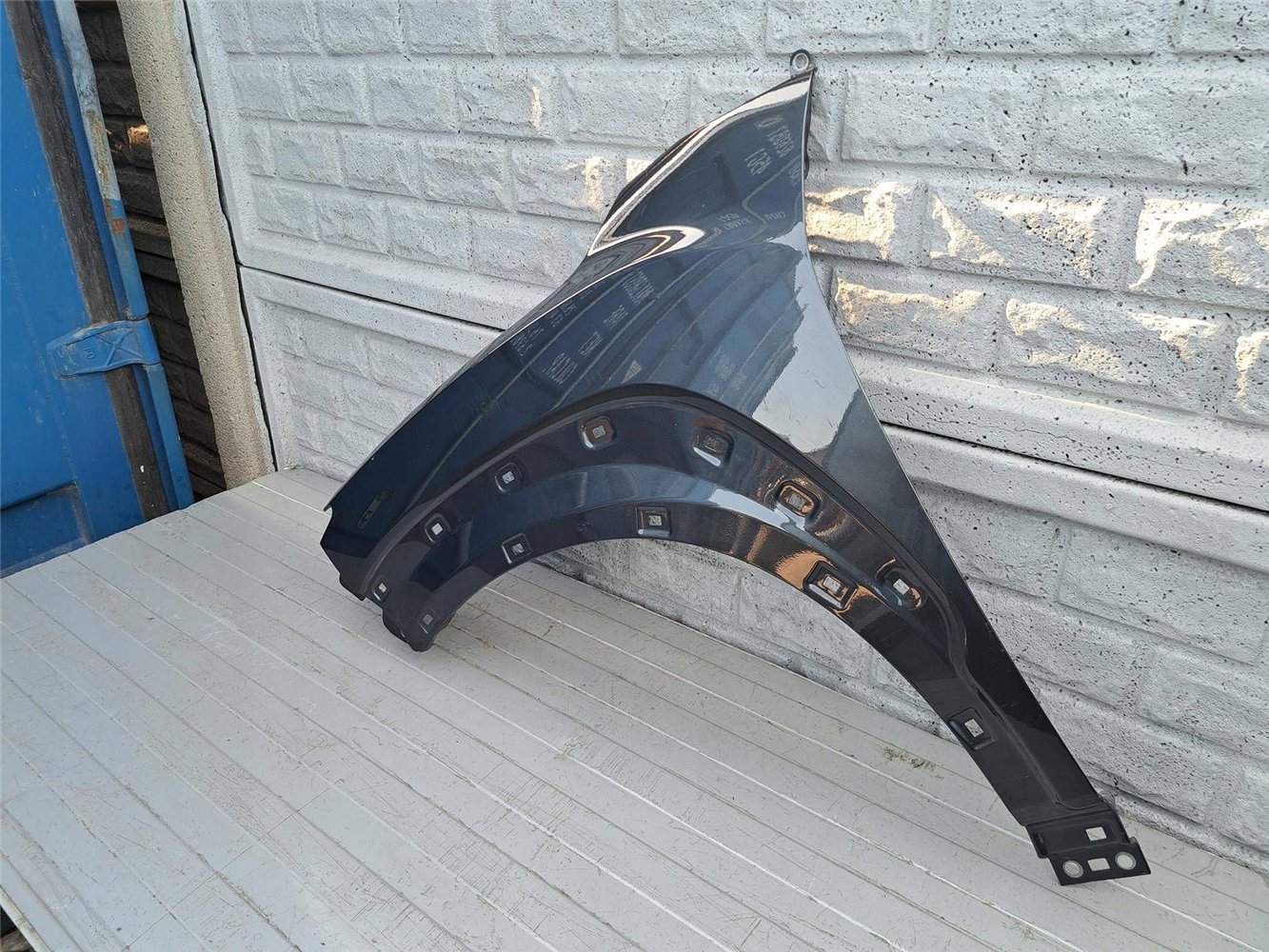 HYUNDAI KONA 2018 - 2024 BŁOTNIK LEWY PRZEDNI ORYGINAŁ (17507800859)