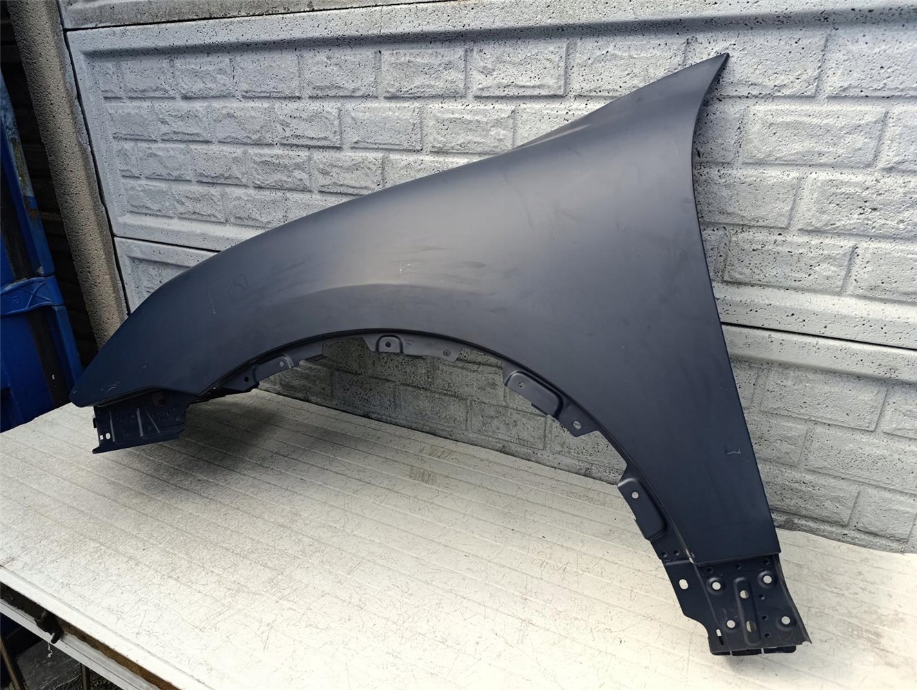 PORSCHE CAYENNE 2010-2014 BŁOTNIK PRZEDNI LEWY ORYGINAŁ (17517607058)