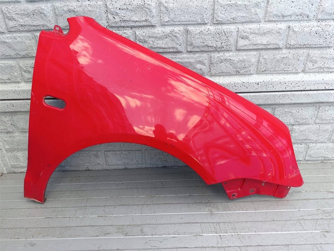 VW POLO IV 4 9N3 BŁOTNIK PRAWY PRZEDNI ORYGINAŁ (17522799827)