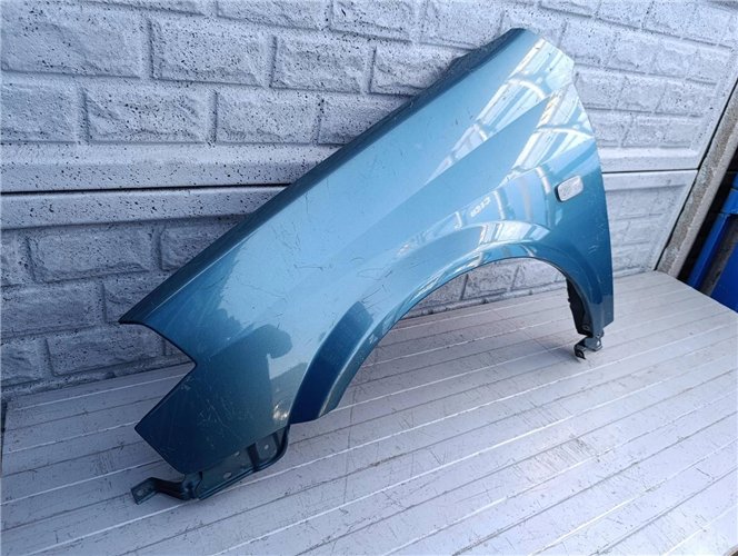 NISSAN PRIMERA BŁOTNIK LEWY PRZÓD ORYGINAŁ (17523023219)