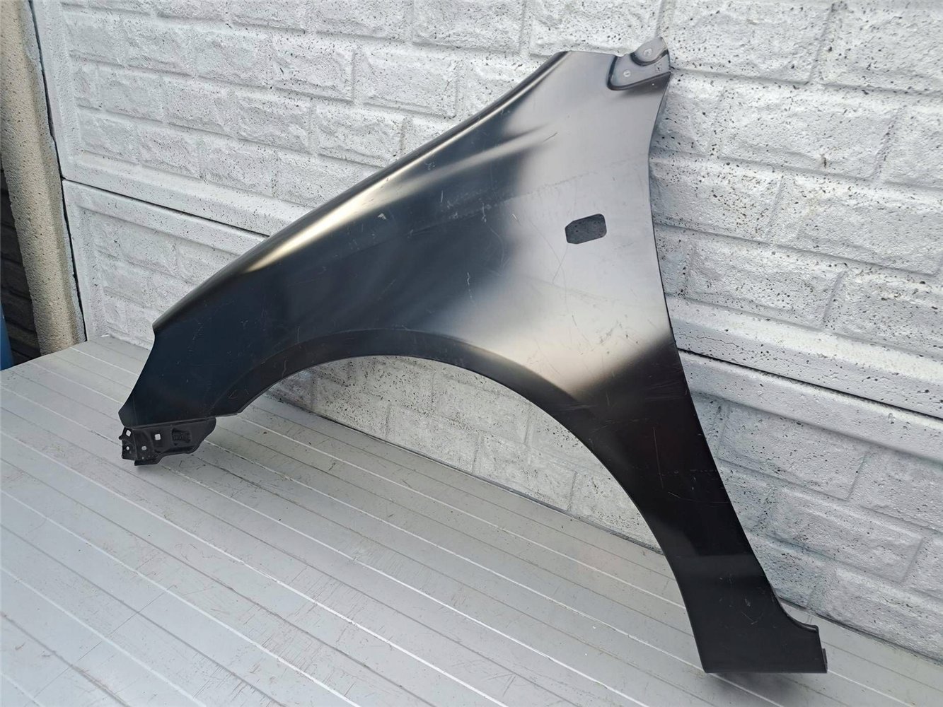 TOYOTA COROLLA E12 SEDAN KOMBI 02-09 BŁOTNIK LEWY NOWY ORYGINAŁ (17524057293)