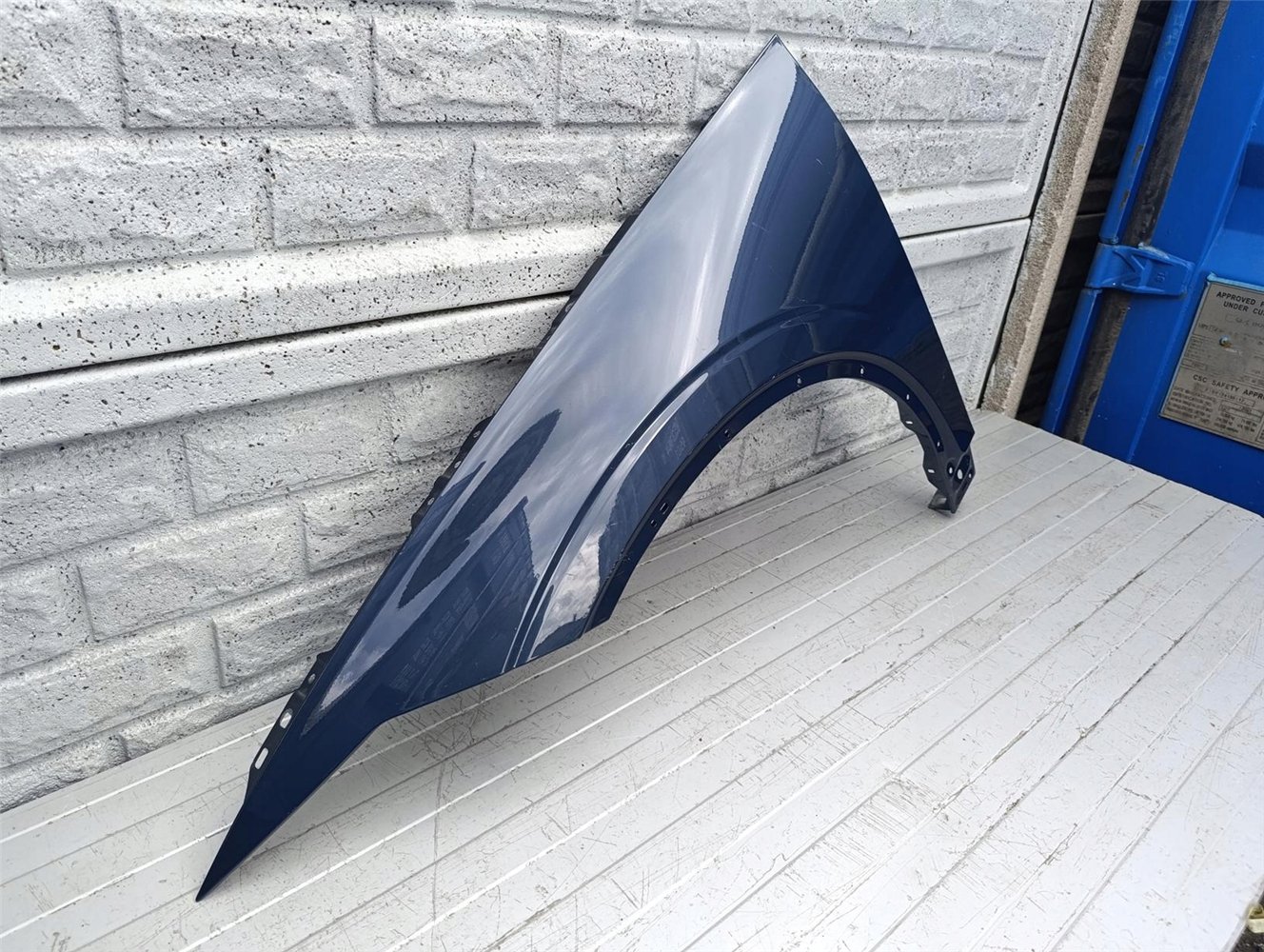 POLESTAR 2 BŁOTNIK PRZEDNI LEWY ORYGINAŁ (17536279942)