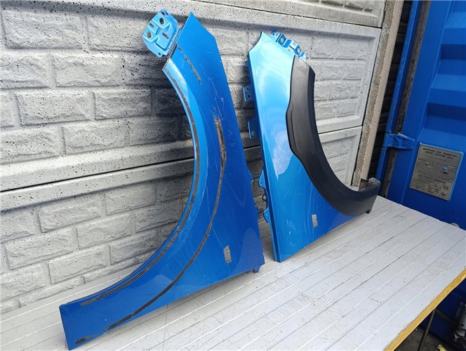 OPEL ADAM ROCKS BŁOTNIK PRZEDNI PRAWY LEWY ORYGINAŁ (17536361846)