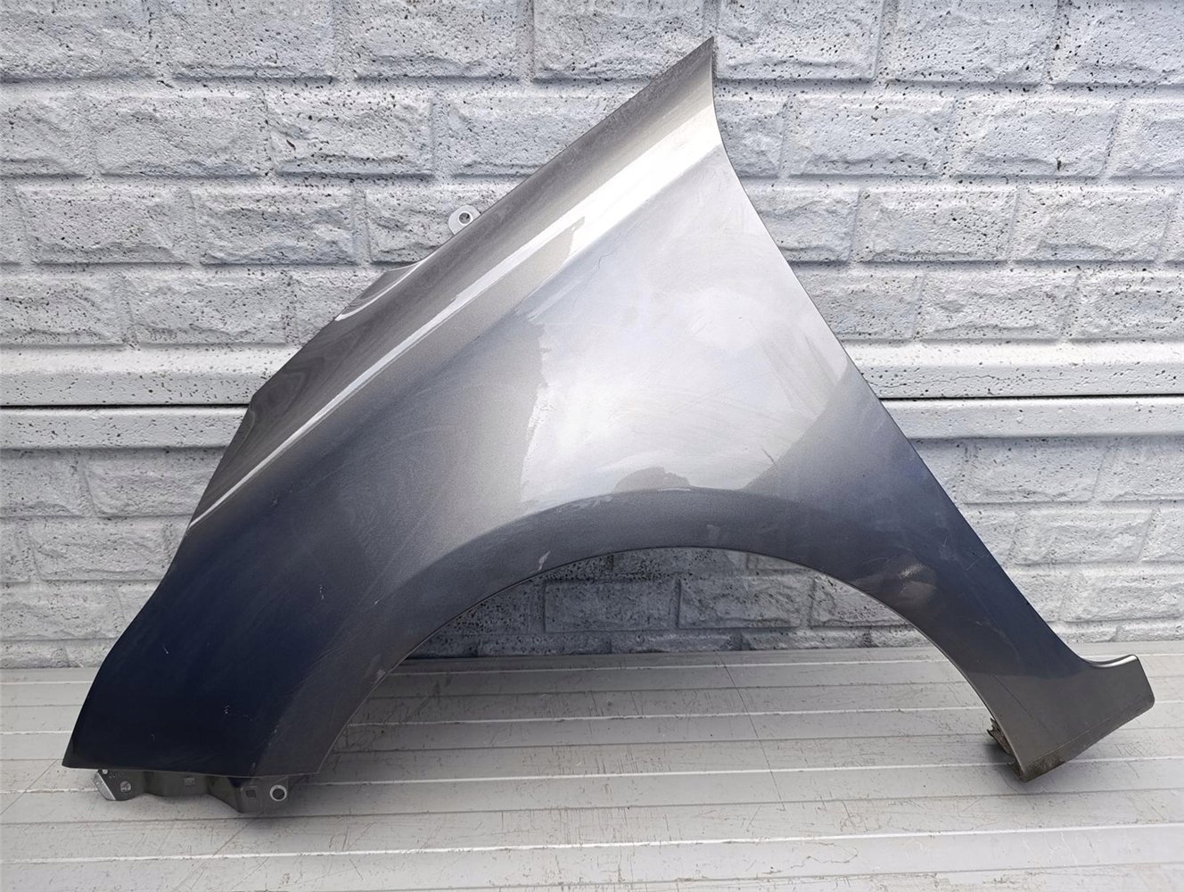 KIA CARENS BŁOTNIK LEWY PRZEDNI ORYGINAŁ (17536400765)