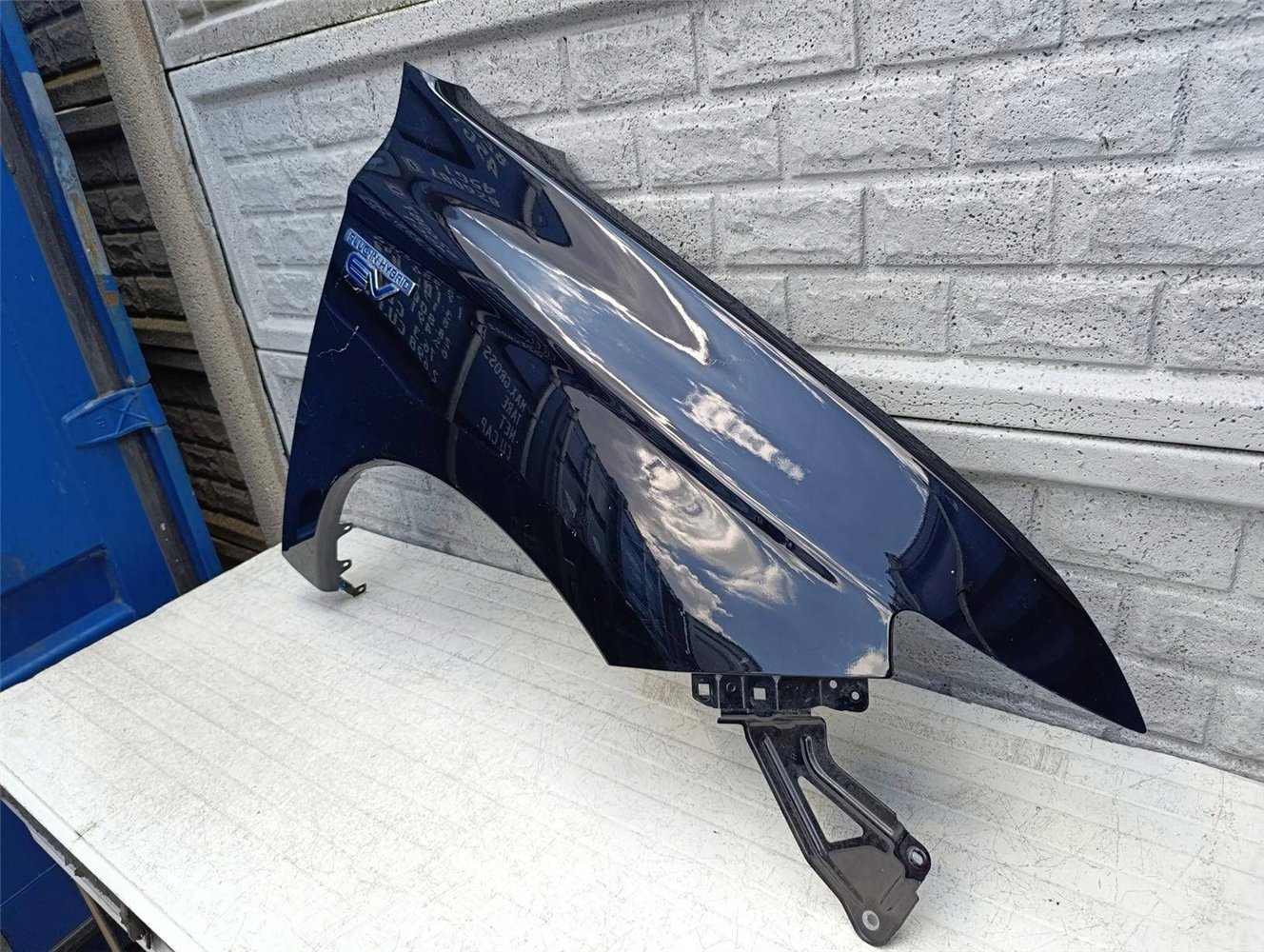 MITSUBISHI OUTLANDER 12-15 BŁOTNIK PRAWY PRZEDNI ORYGINAŁ (17550030670)