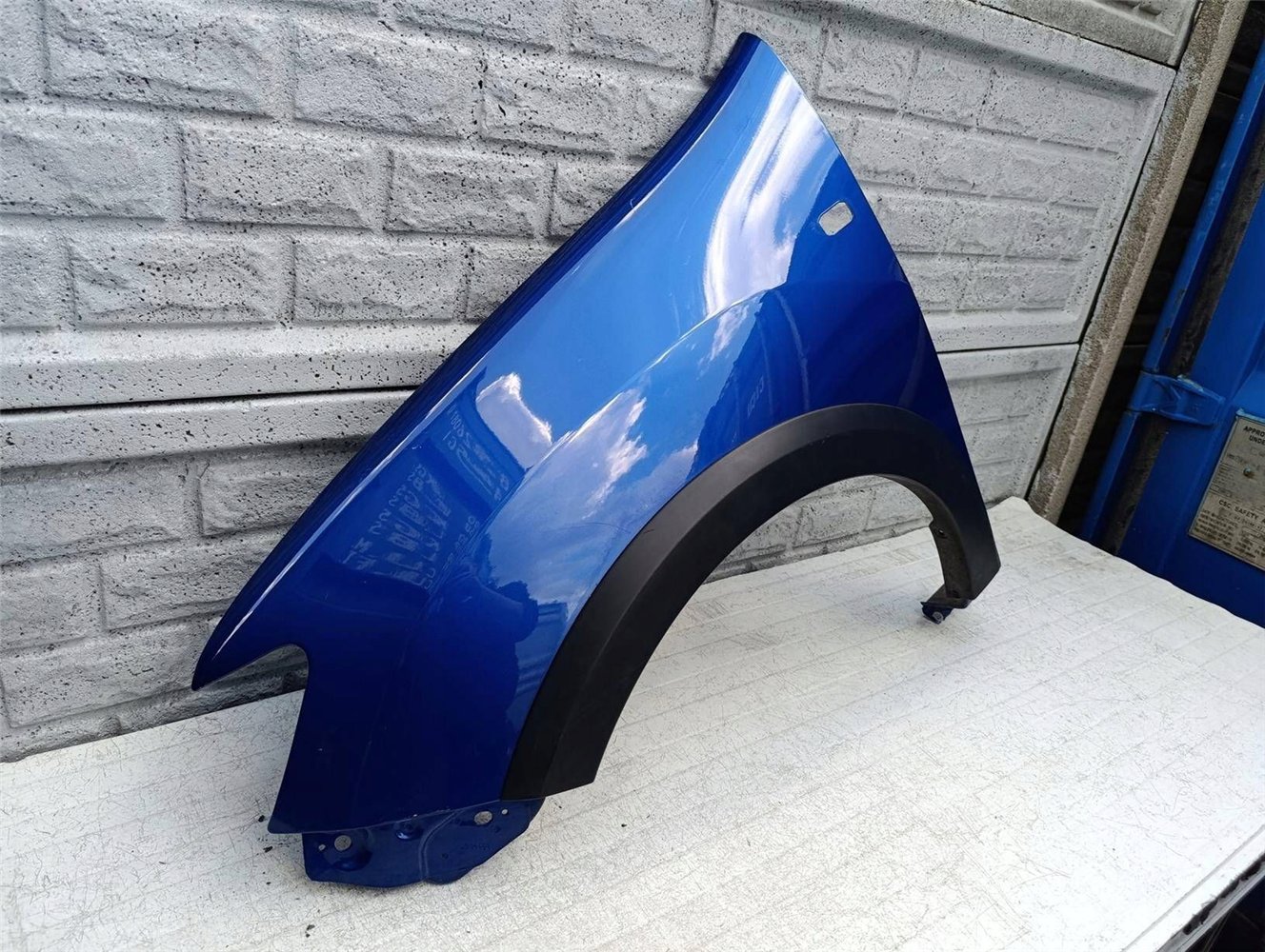 DACIA SANDERO STEPWAY 2 II BŁOTNIK PRZEDNI LEWY ORYGINAŁ (17550319576)