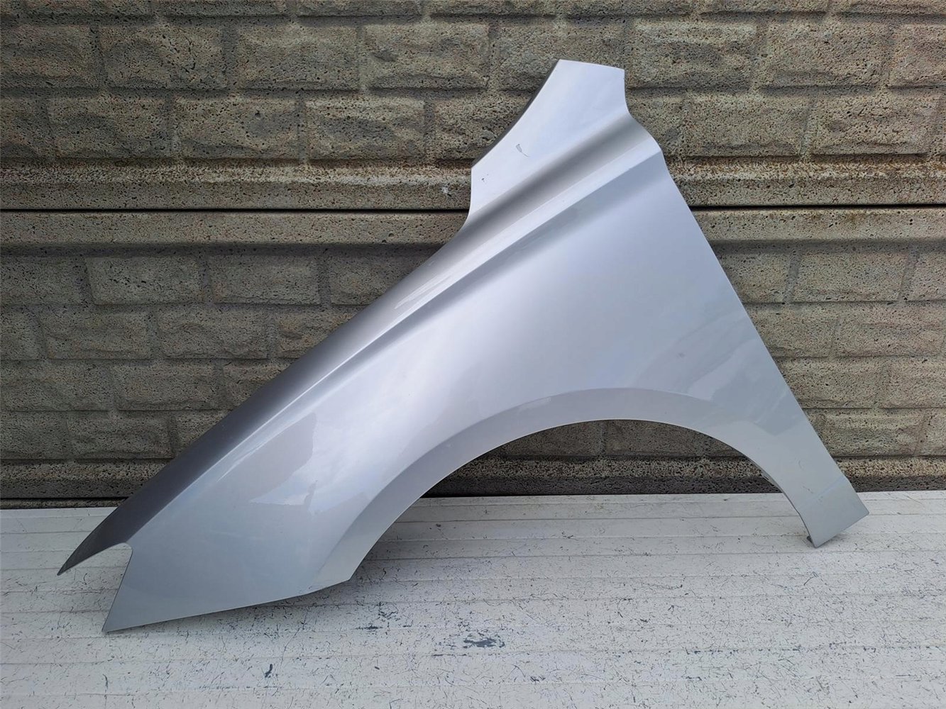 BŁOTNIK LEWY PRZÓD MG 5 EV 2020- ORYGINAŁ (17557492629)