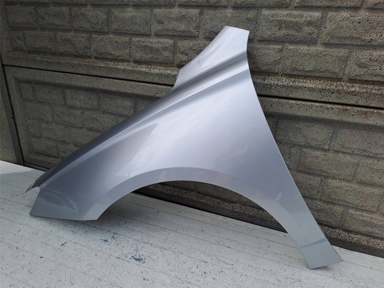 BŁOTNIK LEWY PRZÓD MG 5 EV 2020- ORYGINAŁ (17557492629)