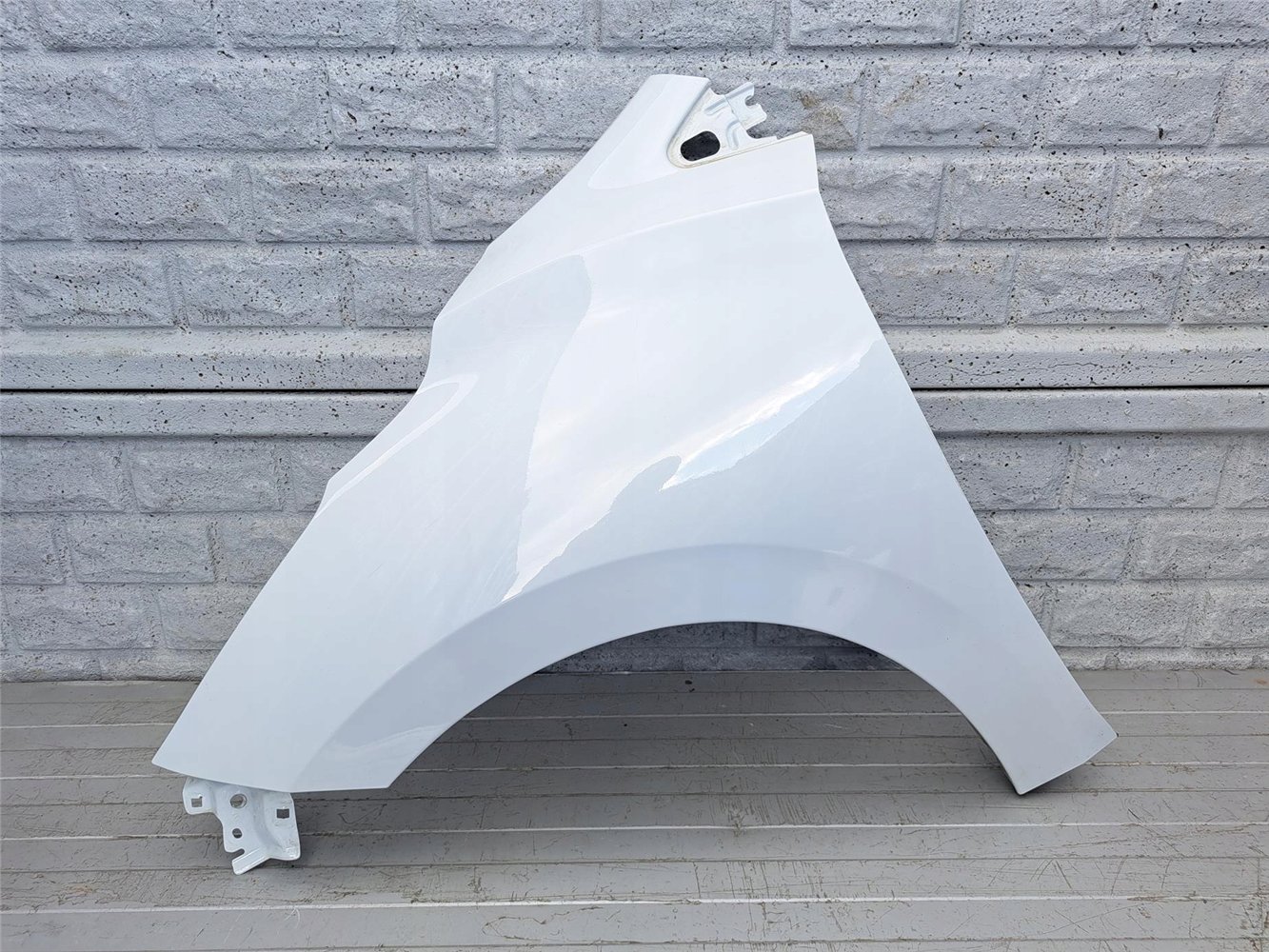 NISSAN MICRA K14 2017 - 2024 BŁOTNIK LEWY PRZEDNI ORYGINAŁ (17567108107)