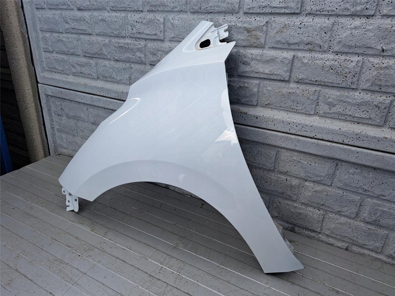 NISSAN MICRA K14 2017 - 2024 BŁOTNIK LEWY PRZEDNI ORYGINAŁ (17567108107)