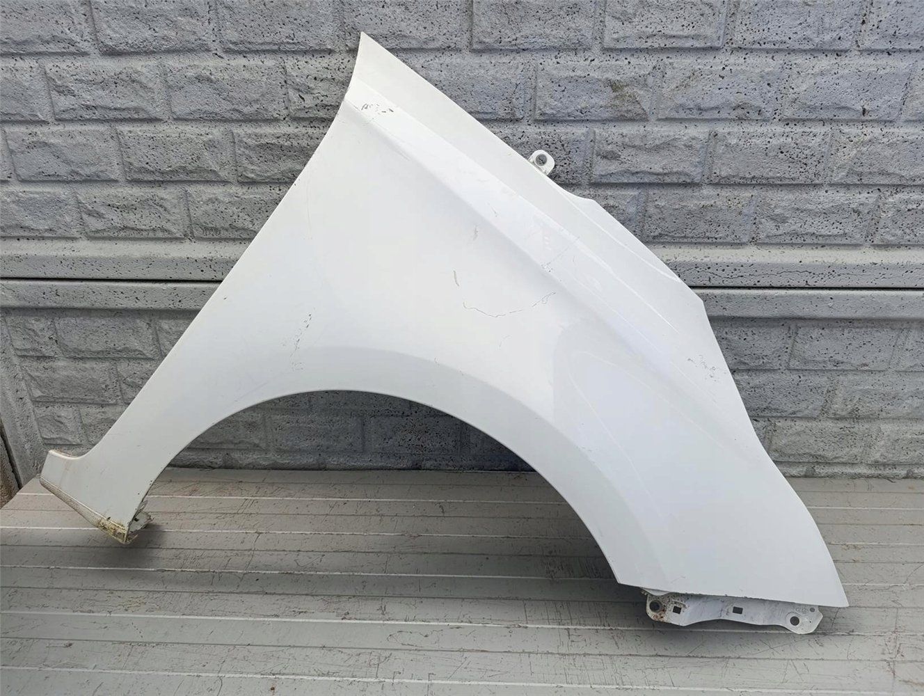 KIA CARENS BŁOTNIK PRAWY PRZEDNI ORYGINAŁ (17570930107)