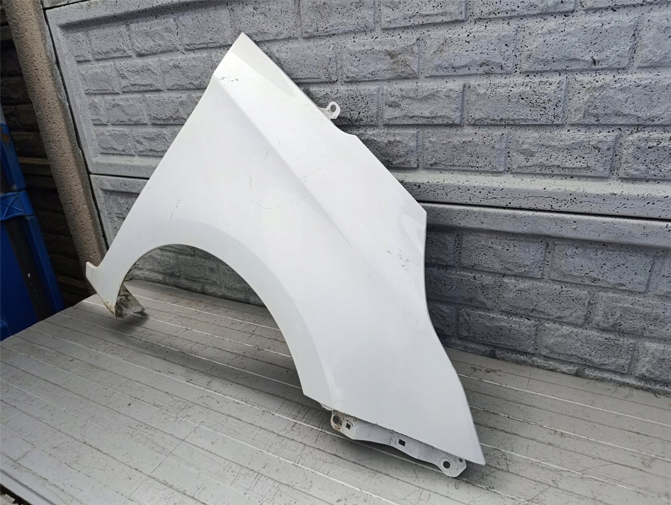 KIA CARENS BŁOTNIK PRAWY PRZEDNI ORYGINAŁ (17570930107)