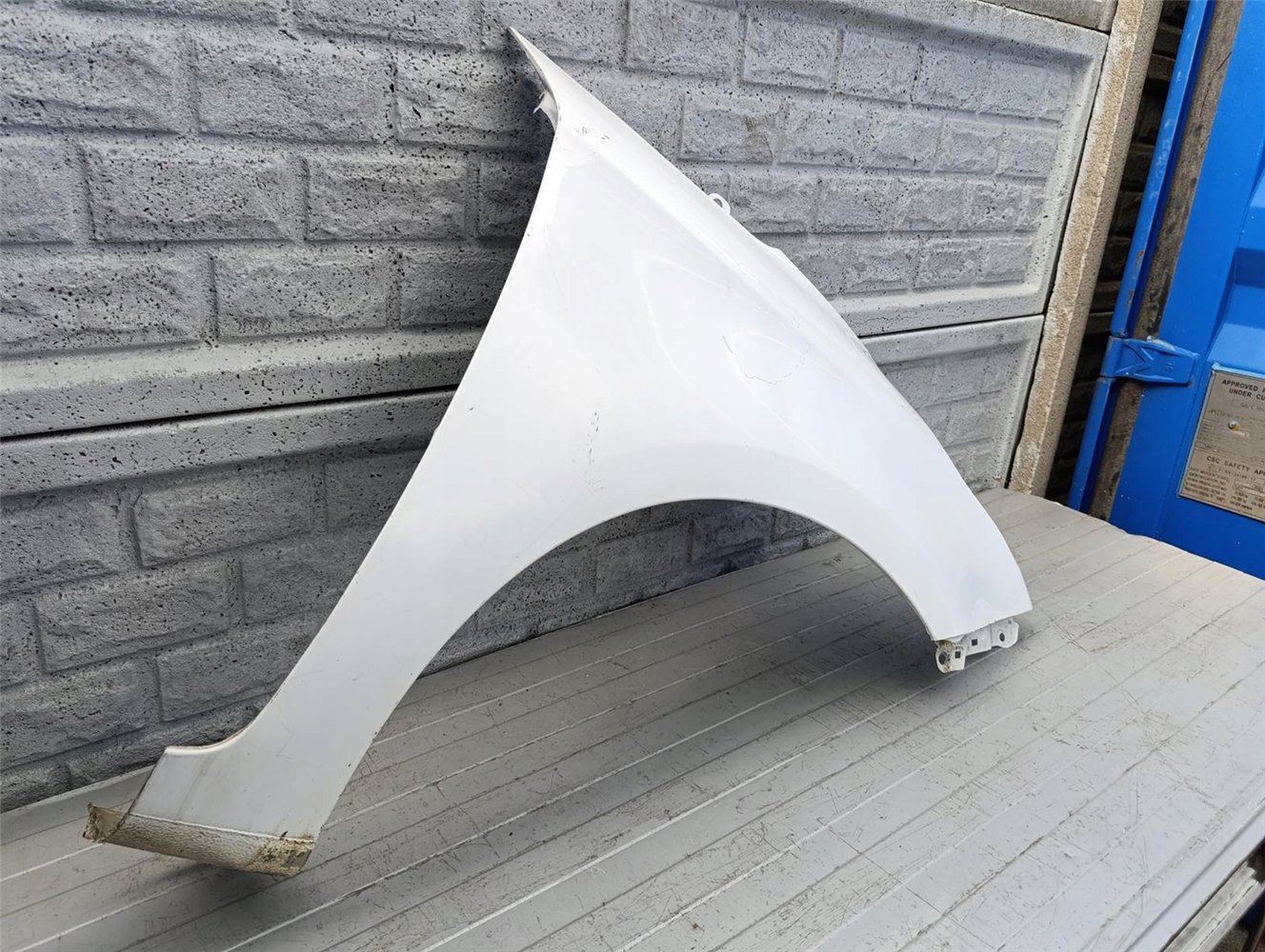 KIA CARENS BŁOTNIK PRAWY PRZEDNI ORYGINAŁ (17570930107)