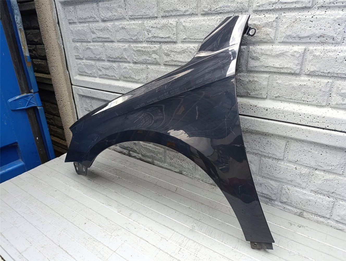 BŁOTNIK PRZEDNI LEWY VW PASSAT B7 2010 - 2017 ORYGINAŁ (17570950257)