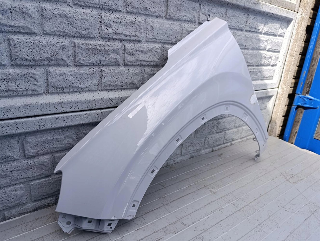 HYUNDAI SANTA FE 19-24 BŁOTNIK LEWY PRZEDNI ORYGINAŁ (17578593470)