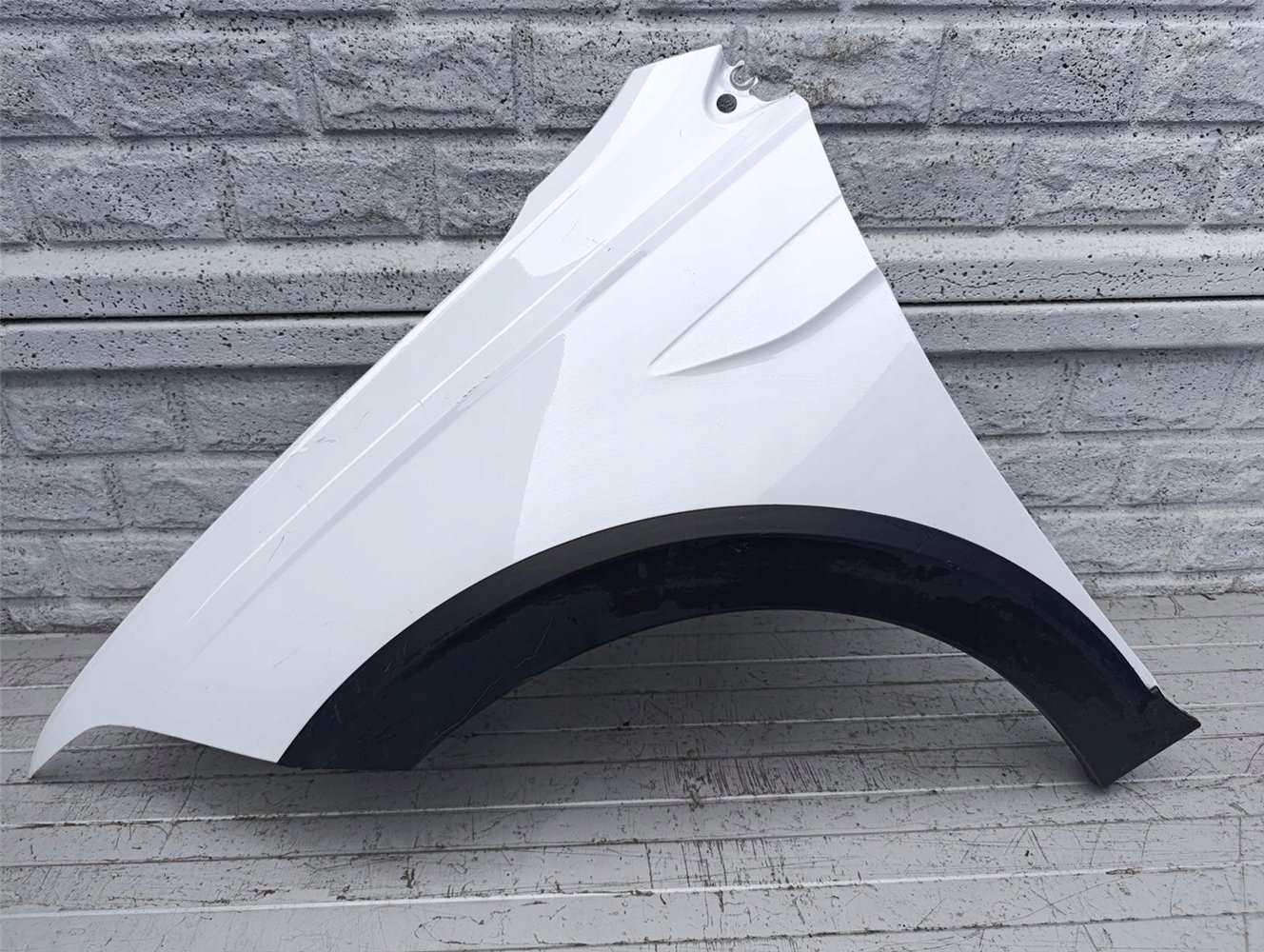 VW TAIGO BŁOTNIK LEWY PRZEDNI ORYGINAŁ (17582213987)