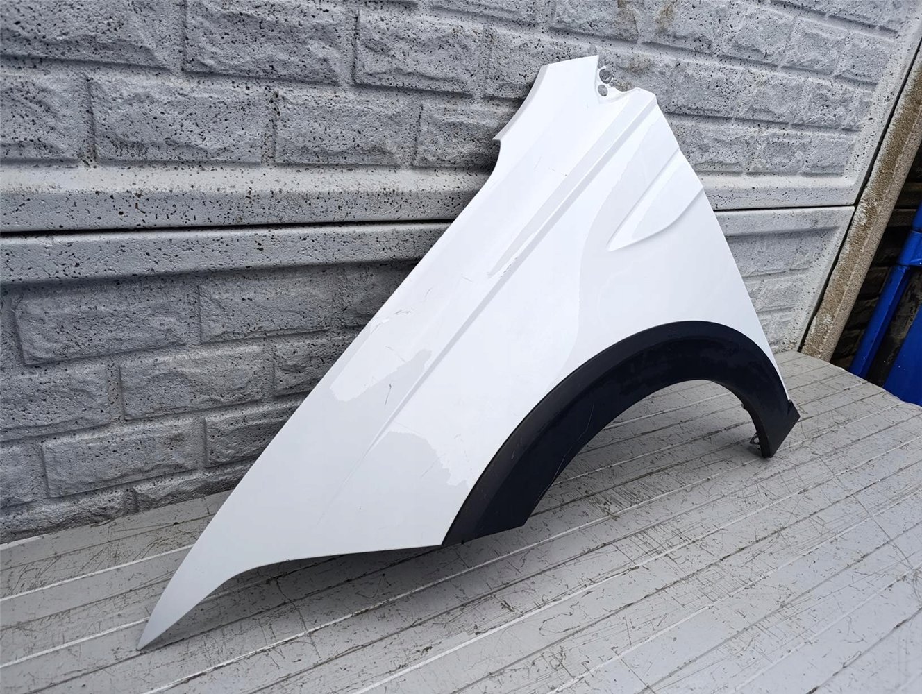 VW TAIGO BŁOTNIK LEWY PRZEDNI ORYGINAŁ (17582213987)