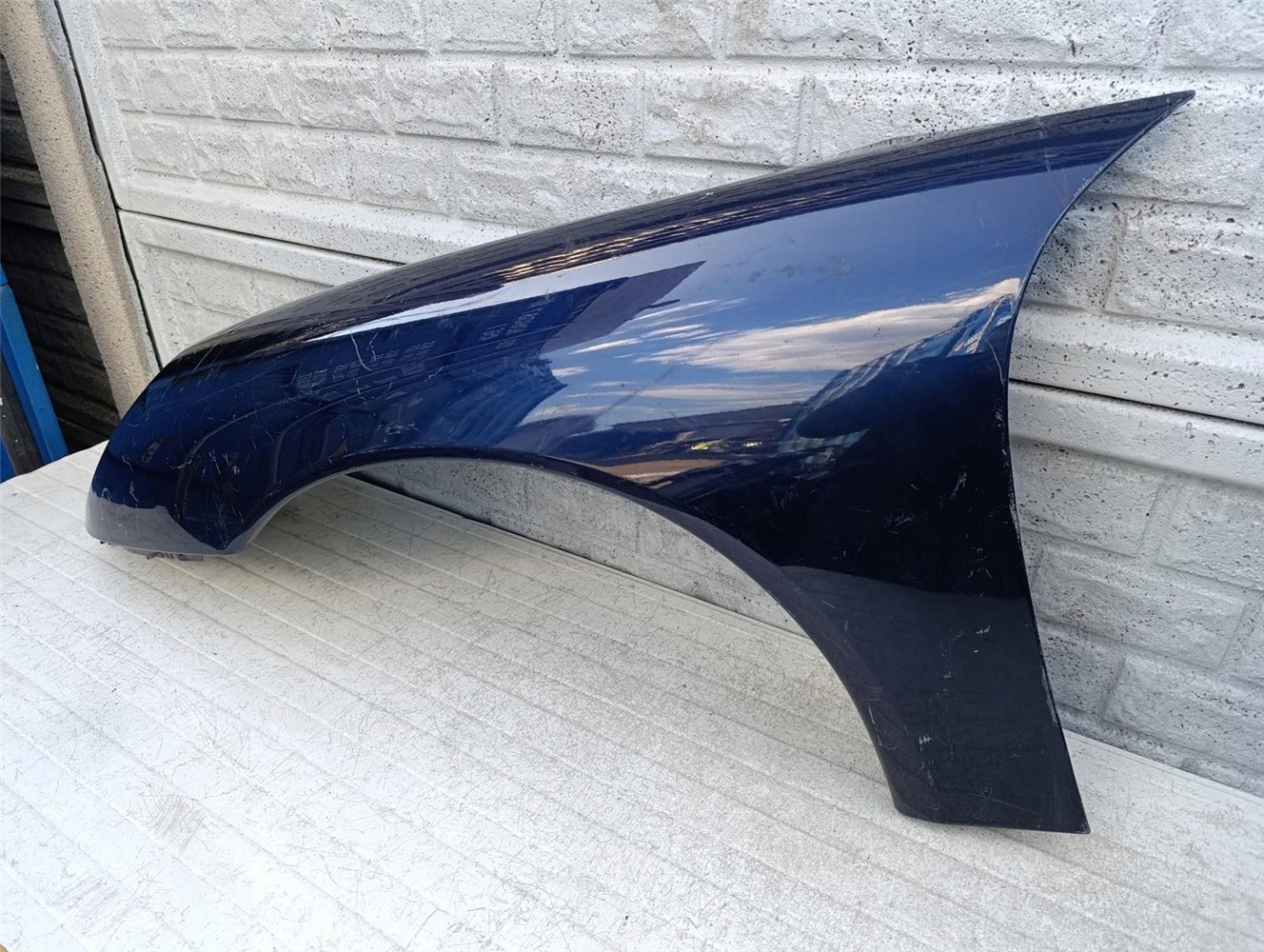 PORSCHE CARRERA 911 996 BŁOTNIK PRZEDNI LEWY ORYGINAŁ (17586098443)