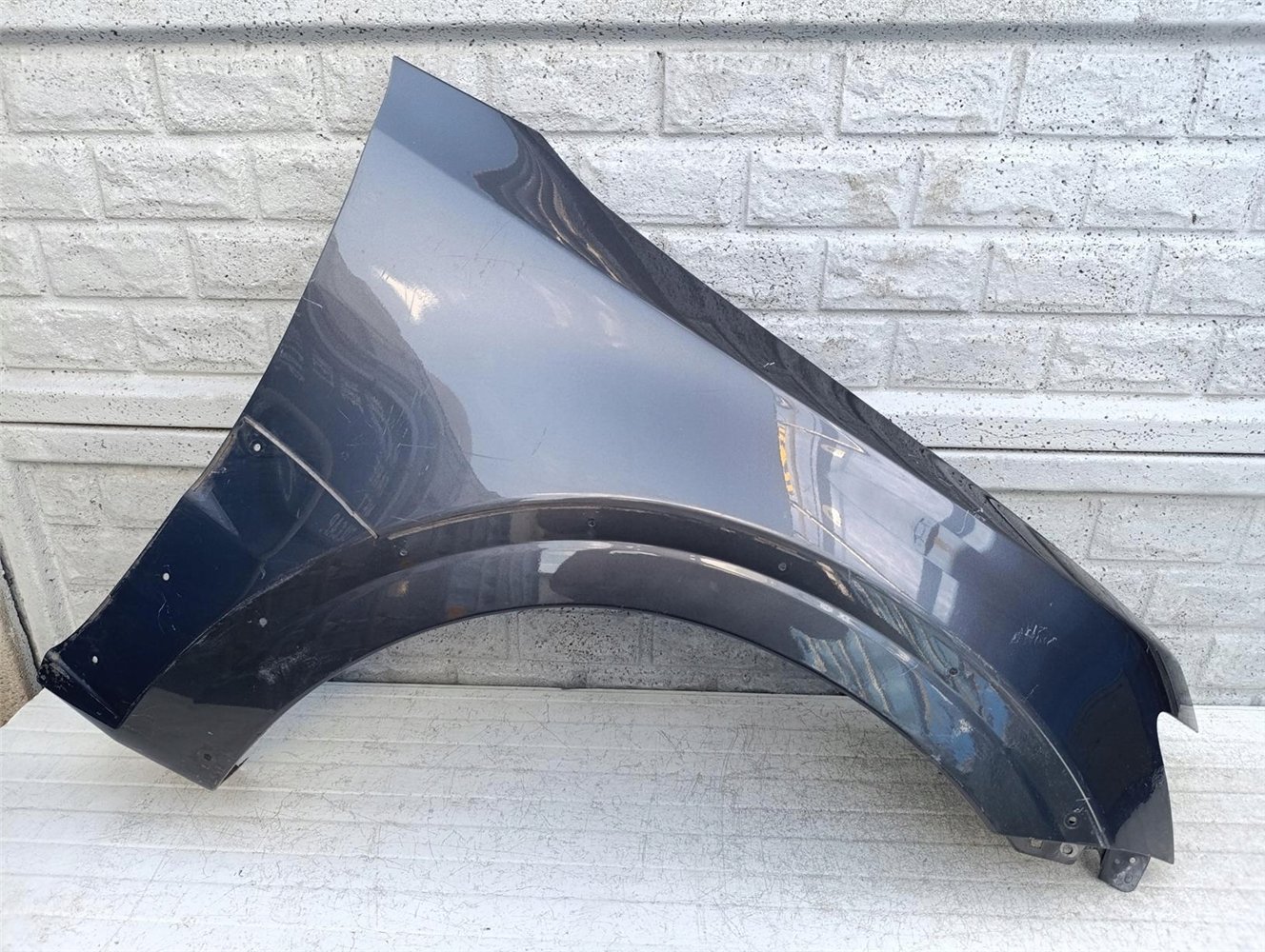 MITSUBISHI PAJERO 06-21 BŁOTNIK PRZEDNI PRAWY ORYGINAŁ (17586116479)